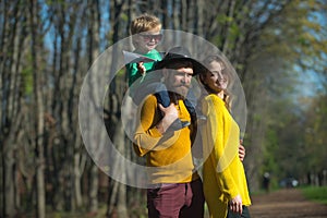 Happy family and little child with paper plane enjoy freedom outdoor. Freedom of movement. Happiness is free