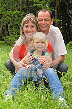 Happy family with little girl