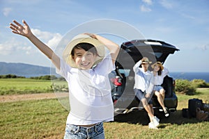 Happy Family with little girl travel by car