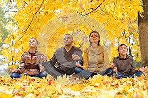 Happy family meditate