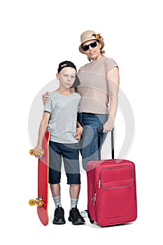 A happy family, a mom in sunglasses and a hat with a red suitcase and her son with a skateboard, isolated