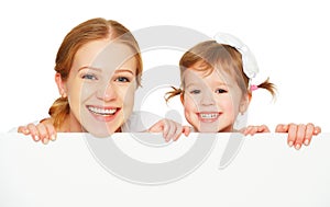 Happy family mother child daughter with blank white poster