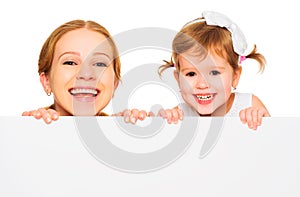 Happy family mother child daughter with blank white poster