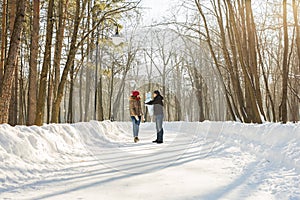 Happy family - Mother, father and child boy on a winter walk.