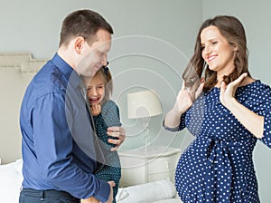 Happy family. Mother, father and child having fun