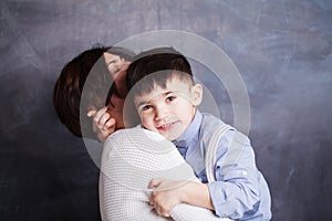 Happy family. Mother and her son hugging, smiling and having fun, portrait