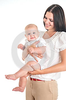 Happy family mother playing and hug with newborn baby on white b