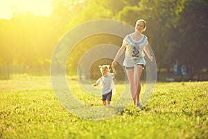 Happy family on nature walks in the summer