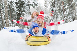 Happy family outdoor in winter