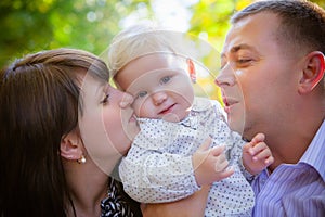 Happy family outdoors in autumn