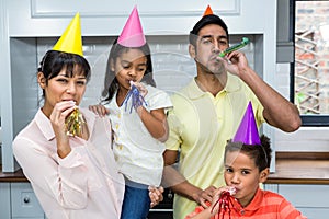 Happy family partying in the kitchen