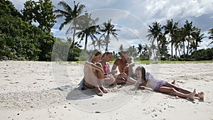 Happy family playing on the beach at the day time