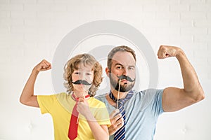 Happy family playing in home