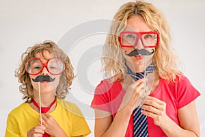 Happy family playing in home