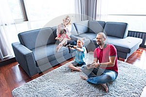 Happy family playing a video game