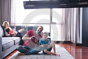 Happy family playing a video game