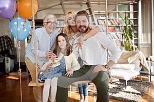 Happy family portrait with grandmother; Happy family offspring concept