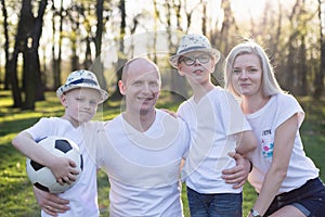 Happy family portrait in park