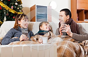 Happy family with radiator