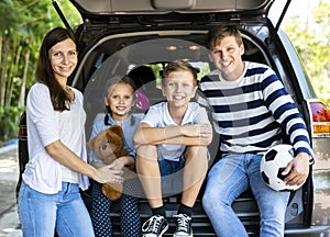 Happy family ready for a road trip