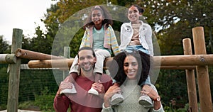 Happy family, relax and park in nature for holiday, weekend of fun bonding together outdoors. Portrait of Father, mother