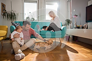 Happy family relaxing at home