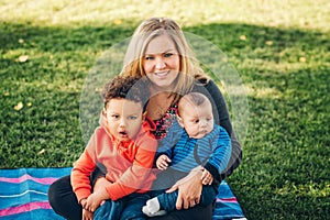 Happy family resting in the park