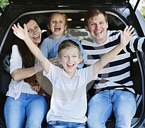 Happy family on a road trip