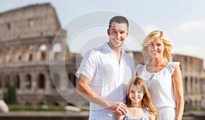 Happy family in rome over coliseum background