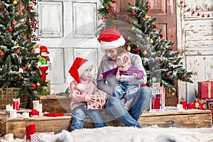 Happy family in Santa hat