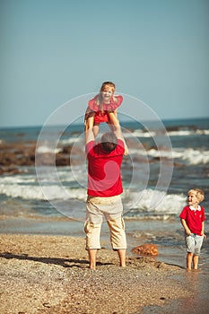 Happy family at the sea