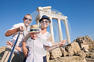 Happy family selfie travel photo cropping for share in social ne