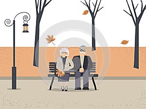 Happy family seniors in autumn park. Cute smiling elderly man and woman  are sitting on bench in park. Retired elderly couple in