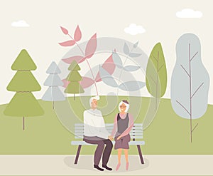 Happy family seniors: cute smiling elderly man and woman hold hands and sit on bench in park. Retired elderly couple in love.Trees