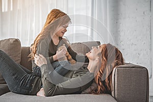 Happy family sharing their love while playing at home