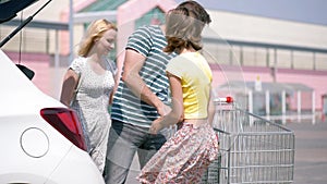 Happy family with shopping carts