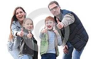 Happy family showing thumbs up