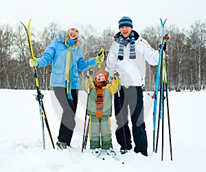 Happy family skiing