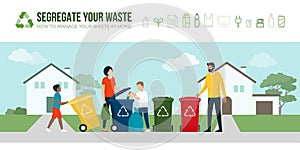 Happy family sorting waste and recycling