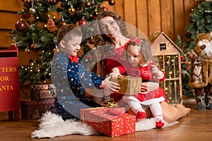 Happy family spend Christmas at home. Family holidays, Christmas tale. Best childhood memories