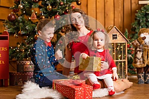 Happy family spend Christmas at home. Family holidays, Christmas tale. Best childhood memories