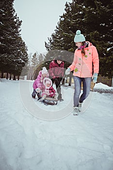 Happy family spending time outdoor in winter