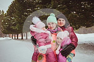 Happy family spending time outdoor in winter