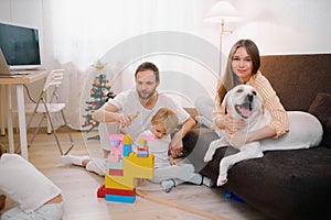 Happy family spending time together at home