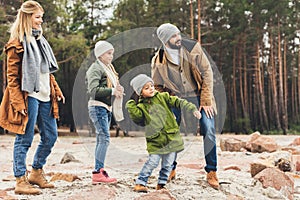 happy family spending time together on nature