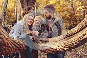 Happy family spending time together outdoor. Lifestyle capture, rural cozy scene