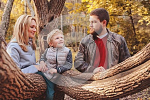 Happy family spending time together outdoor. Lifestyle capture, rural cozy scene