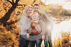 Happy family spending time together outdoor. Lifestyle capture, rural cozy scene