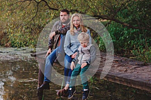 Happy family spending time together outdoor. Lifestyle capture, rural cozy scene