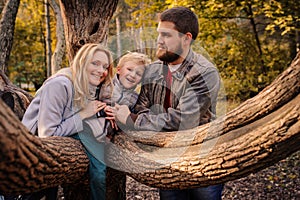 Happy family spending time together outdoor. Lifestyle capture, rural cozy scene